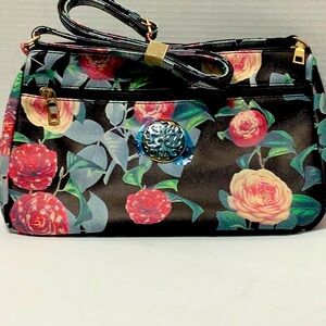 Floral shoulder bag or could be a cross bag.